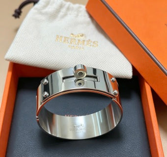 Hermès Silver Signature Lock Cuff Bracelet
