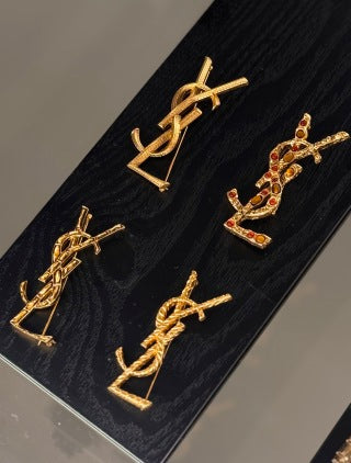 YSL Cassandre Ruby Emblem Brooch